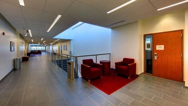 The second-floor hallway faces additional rooms for WordCamp sessions.