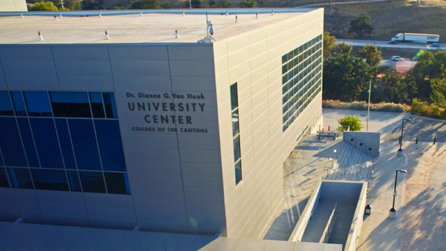 Aerial view of the University Center with Interstate 5 in the background, showing how close to the venue the road is.