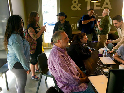 Local community members chatting at a WordPress Meetup.
