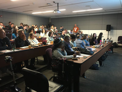 Attendees at WordCamp Santa Clarita during a presentation in the Lecture Hall.